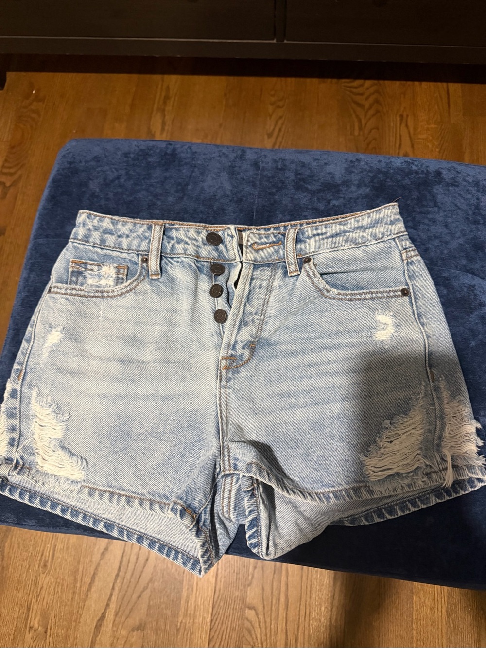 Light Blue Distressed Denim Shorts with Button Front